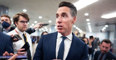 Sen. Josh Hawley, R-Mo., walks through the Capitol amid the federal government shutdown.