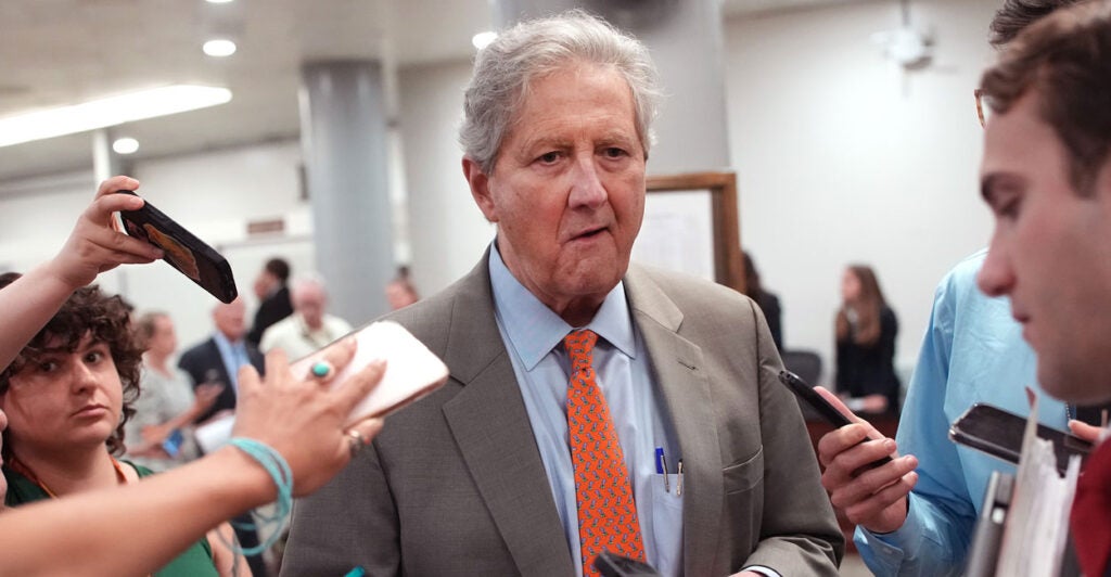 John Kennedy speaks to reporters in the capitol.