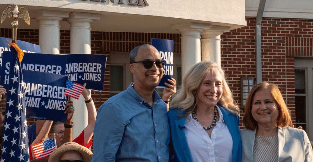 Jay Jones, Abigail Spanberger, and Ghazala Hashmi at a rally