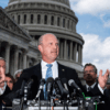 Kevin Roberts, president of The Heritage Foundation, speaks with members of the conservative House Freedom Caucus during a news conference on Capitol Hill on Tuesday, Sept 12, 2023