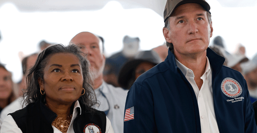 Virginia Lt. Gov. Winsome Earle-Sears aspires to succeed her fellow Republican, Gov. Glenn Youngkin. They are seen here together at a NASCAR event at Martinsville Speedway on March 30 in Martinsville, Virginia.