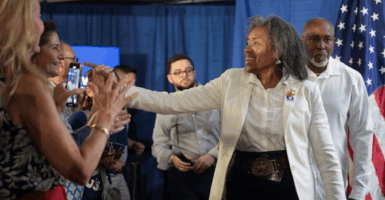 Virginia Lt. Gov. Winsome Earle-Sears shakes hands at a gubernatorial campaign event at the Vienna Volunteer Fire Department on July 1 in Vienna, Virginia.