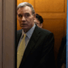 Senator Mark Warner (D-VA) boards an elevator at the U.S. Capitol