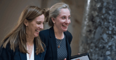 Abigail Spanberger, D-Va., right, and Mikie Sherrill, D-N.J., laughing together in the Capitol's Statuary Hall January 23, 2019.