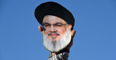 People gather in the Lebanese capital Beirut to attend a memorial ceremony marking the first anniversary of Hezbollah leaders Hassan Nasrallah and Hashem Safieddine's deaths.