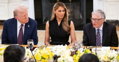 President Donald Trump and first lady Melania Trump host tech leaders, including Microsoft founder Bill Gates (right) in the State Dining Room of the White House on Sept. 4.