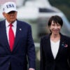 Donald Trump walks with Japanese Prime Minister Sanae Takaichi.