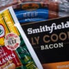 In this photo illustration, meat products from Smithfield Foods are offered for sale at a grocery store in Chicago, Ill.