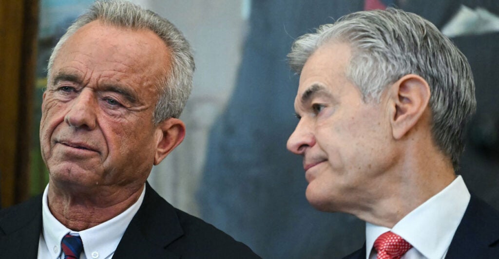 Close up of Robert F. Kennedy, Jr. and Dr. Mehmet Oz.