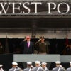 President Donald Trump and superintendent Lieutenant General Steven W. Gilland salute graduates of the United States Military Academy at West Point.
