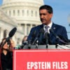 Rep. Ro Khanna, D-Calif., speaks at a press conference in front of the Capitol. Podium has sign reading "Epstein Files."