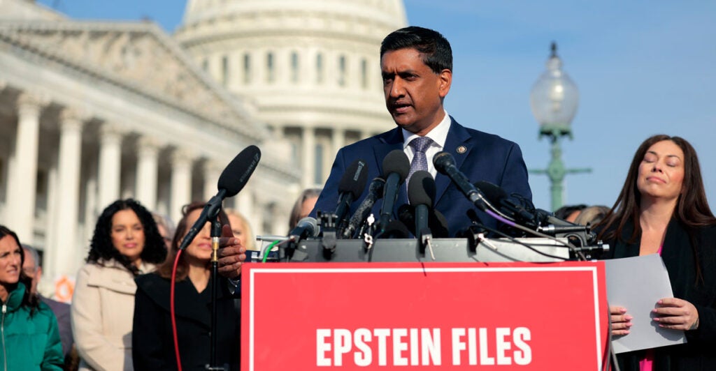 Rep. Ro Khanna, D-Calif., speaks at a press conference in front of the Capitol. Podium has sign reading "Epstein Files."