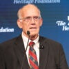 Victor Davis Hanson against a blue Heritage Foundation backdrop.