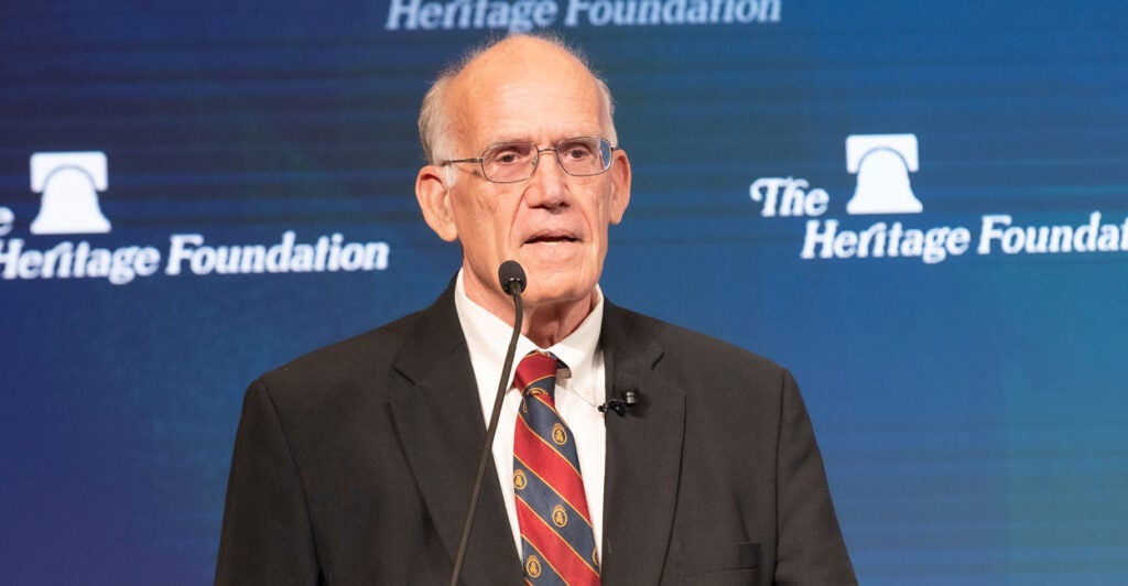 Victor Davis Hanson against a blue Heritage Foundation backdrop.