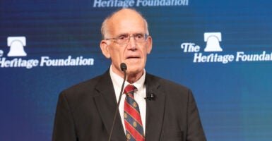 Victor Davis Hanson against a blue Heritage Foundation backdrop.