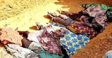 Blankets cover the bodies of slain Christians in Nigeria.