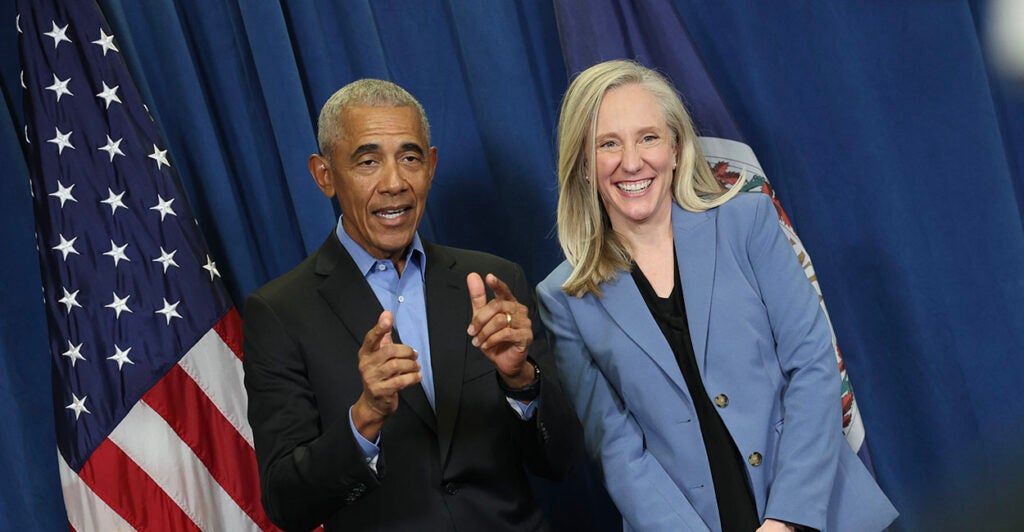 Barack Obama and Abigail Spanberger pose for a photo. Before they spoke, Jay Jones appeared at their rally, tying the Democrats to Jones' politically violent rhetoric.