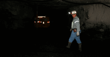 A miner walks down a tunnel at the Sufco Coal Mine, 30 miles east of Salina, Utah on May 28, 2014.