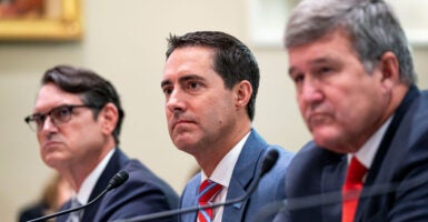 (L-R) Florida Secretary of State Cord Byrd, Ohio Secretary of State Frank LaRose (C) and West Virginia Secretary of State Mac Warner (R).