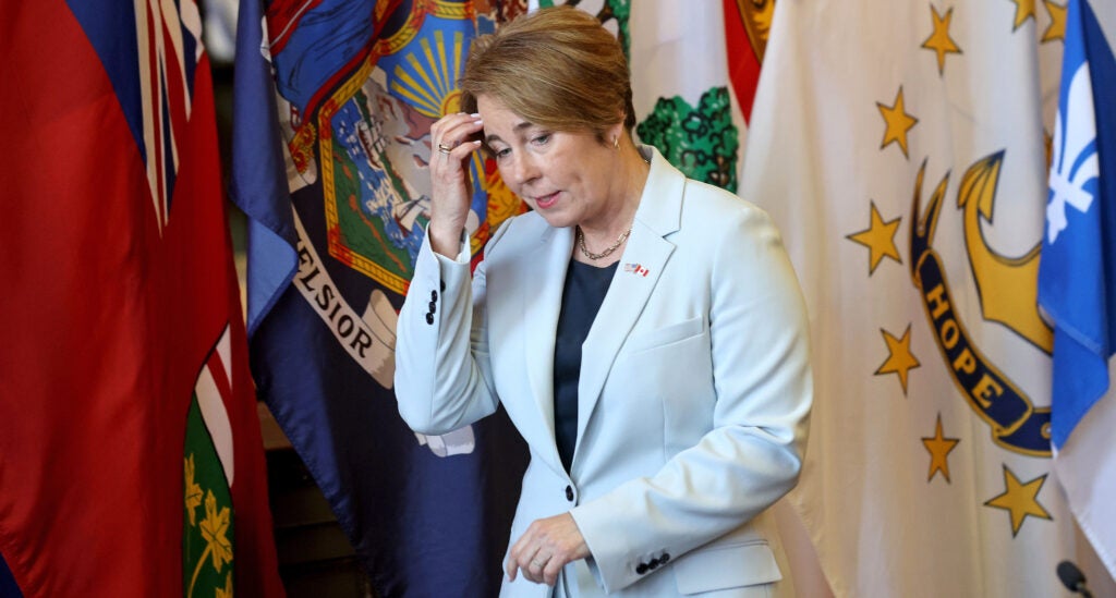 Governor Maura Healey walks into the Northeast Governors and Canadian Premiers moderated discussion at the State House Library.