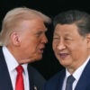 President Donald Trump talks to Chinese leader Xi Jinping