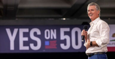 California Governor Gavin Newsom speaks at a "Yes On Prop 50" volunteer event.