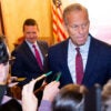 John Thune speaks to members of the press as he heads to his office in the Capitol Building on November 8, 2025 in Washington, DC.