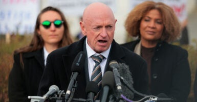 Sen. Mark Kelly, R-Ariz., speaks during a news conference on the "Epstein Files" outside the U.S. Capitol on November 18, 2025 in Washington, DC.