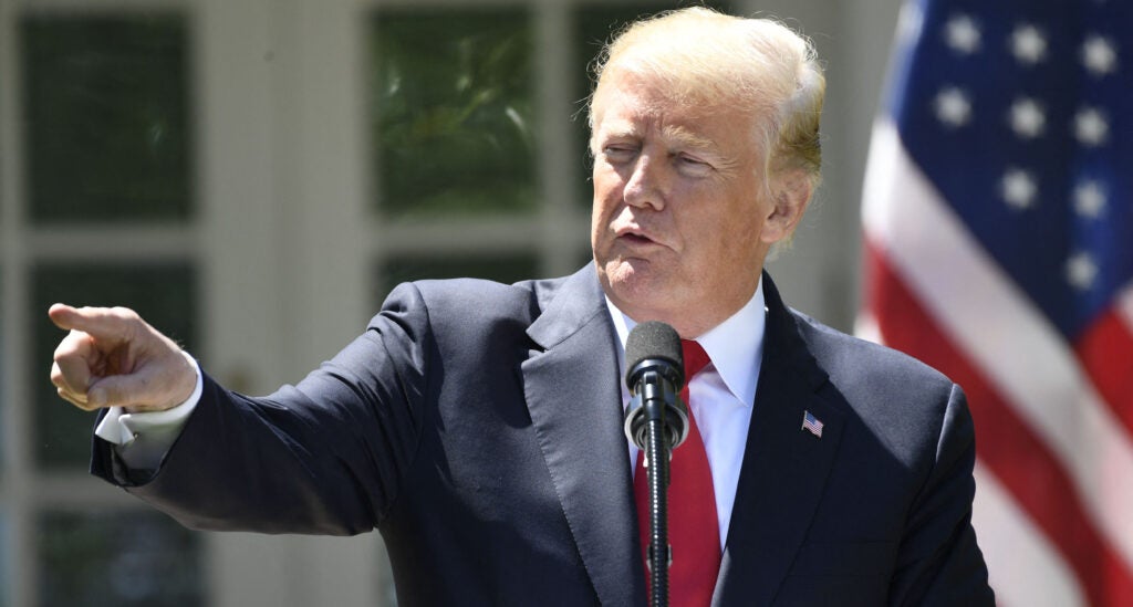US President Donald Trump speaks and points during a joint press conference with Nigerian President Muhammadu Buhari in the Rose Garden of the White House on April 30, 2018, in Washington, DC.