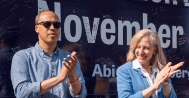 Jay Jones and Abigal Spanberger in Fairfax, Virginia on a bus tour strop.