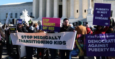 Protesters at the Supreme Court oppose "gender-affirming care"