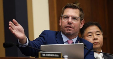 Rep. Eric Swalwell gestures during a committee hearing.