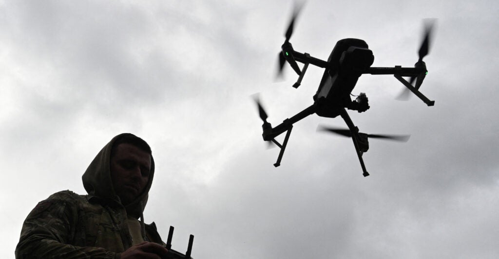 A Ukrainian serviceman operates a drone