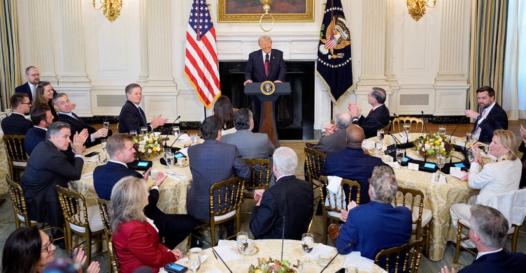 President Donald Trump speaks to senators.
