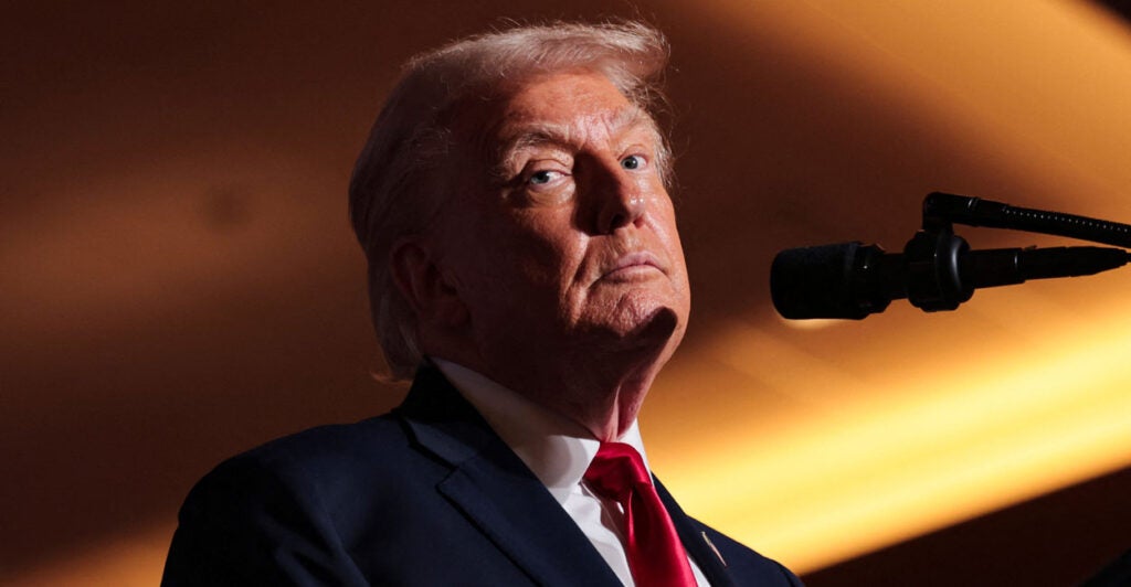 President Donald Trump looks on as he delivers remarks on the U.S. economy.