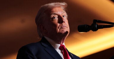 President Donald Trump looks on as he delivers remarks on the U.S. economy.