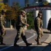 Members of the National Guard cross a street in Memphis.