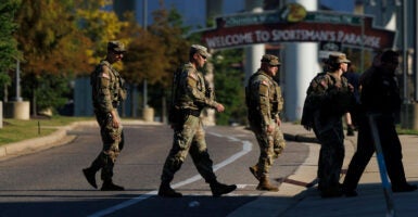 Members of the National Guard cross a street in Memphis.