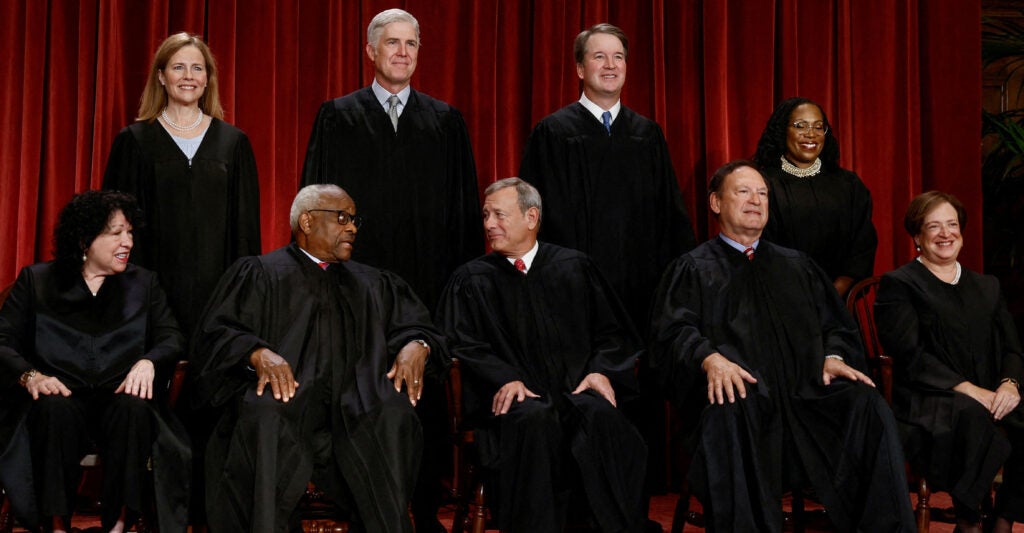 FILE PHOTO: U.S. Supreme Court justices pose for their group portrait at the Supreme Court in Washington, U.S., October 7, 2022. Seated (L-R): Justices Sonia Sotomayor, Clarence Thomas, Chief Justice John G. Roberts, Jr., Samuel A. Alito, Jr. and Elena Kagan. Standing (L-R): Justices Amy Coney Barrett, Neil M. Gorsuch, Brett M. Kavanaugh and Ketanji Brown Jackson. REUTERS/Evelyn Hockstein/File Photo