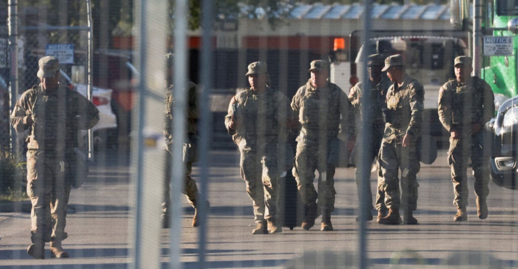 A group of National Guardsmen on a street.
