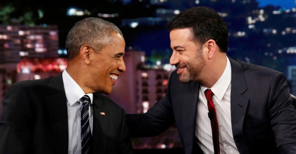 Jimmy Kimmel and Barack Obama smile adoringly at each other on the set of Kimmel's show.