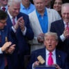 President Trump with gavel, surrounded by top Republicans at signing of One Big Beautiful Bill.