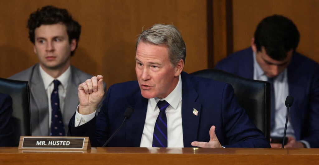 Sen. Jon Husted speaks during a committee hearing.