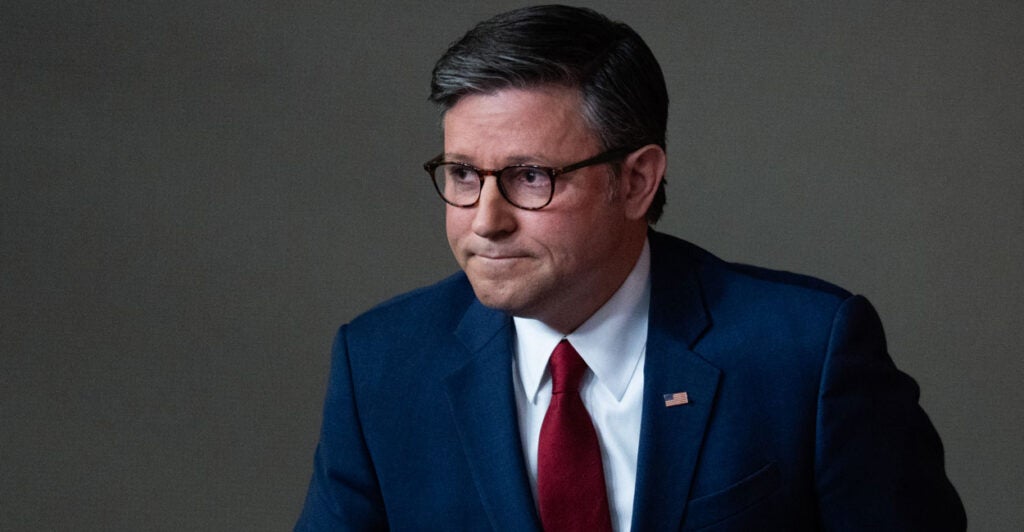 Speaker of the House Mike Johnson with his lips pursed.