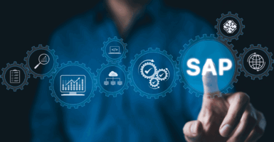 SAP system and business process automation concept. Businessman with icons SAP (System Applications and Products) software for business process automation, data management, and digital transformation.