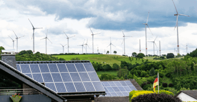 PRODUCTION - 06 June 2025, North Rhine-Westphalia, Borchen: Many houses in the center of Etteln are equipped with solar panels on the roofs. Just beyond the village boundary, countless wind turbines produce electricity. The village with its 1750 inhabitants is pursuing an ambitious digitalization strategy: fibre optic network is available everywhere - laid on a voluntary basis by the village community. There is a village app, digital showcases, digital carpooling opportunities and an electric village car. Last year, Etteln won the Smart City Award ahead of Hong Kong. Photo: David Inderlied/dpa (Photo by David Inderlied/picture alliance via Getty Images)