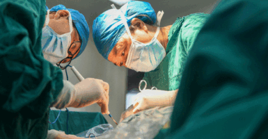YONGZHOU, CHINA - AUGUST 19: Medical staff perform a cesarean section surgery on a pregnant woman at a hospital on August 19, 2025 in Yongzhou, Hunan Province of China. Chinese Doctors' Day is celebrated annually on August 19. (Photo by Jiang Keqing/VCG via Getty Images)