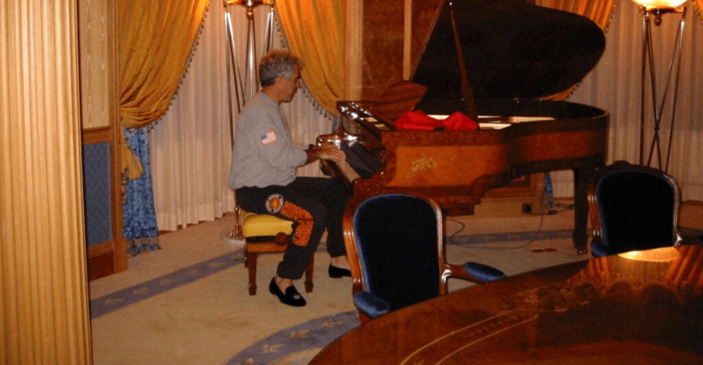 Jeffrey Epstein plays the piano in this image from the estate of late financier and convicted sex offender Jeffrey Epstein, released by the Department of Justice in Washington, D.C., U.S., on December 19, 2025. U.S. Justice Department/Handout via REUTERS THIS IMAGE HAS BEEN SUPPLIED BY A THIRD PARTY