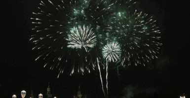 Fireworks light the sky over the Kremlin and St. Basil's Cathedral during the New Year's Day celebrations in central Moscow, Russia January 1, 2018. REUTERS/Tatyana Makeyeva
