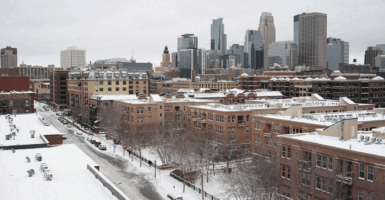 Downtown Minneapolis is blanketed in snow during the spring snowstorm in Minneapolis, Minnesota, U.S., April 11, 2019. REUTERS/Annabelle Marcovici